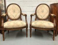 Antique French Louis XVI Style Carved Walnut Fauteuils.jpg